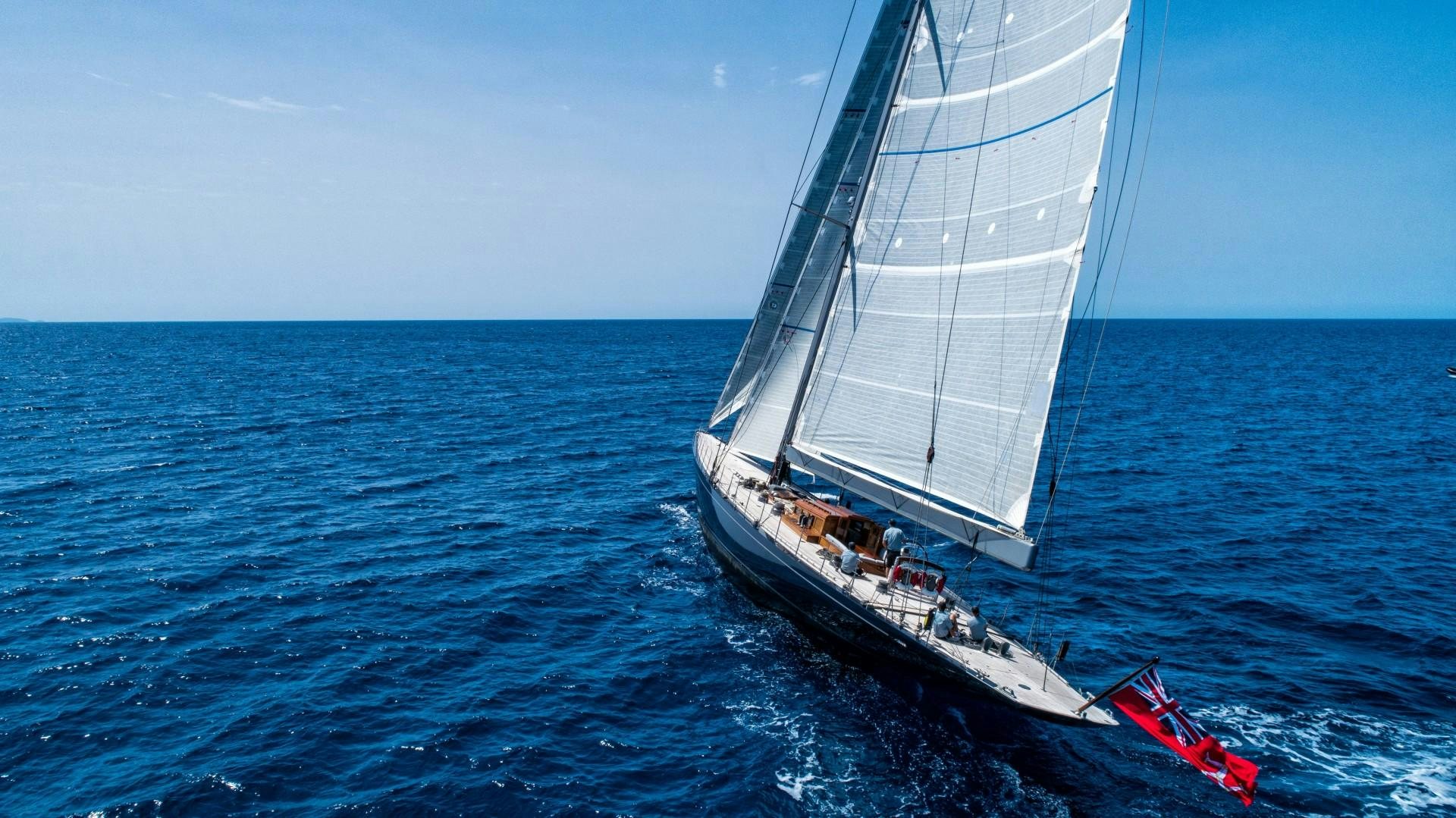 a boat sailing in the sea aboard RAINBOW Yacht for Sale