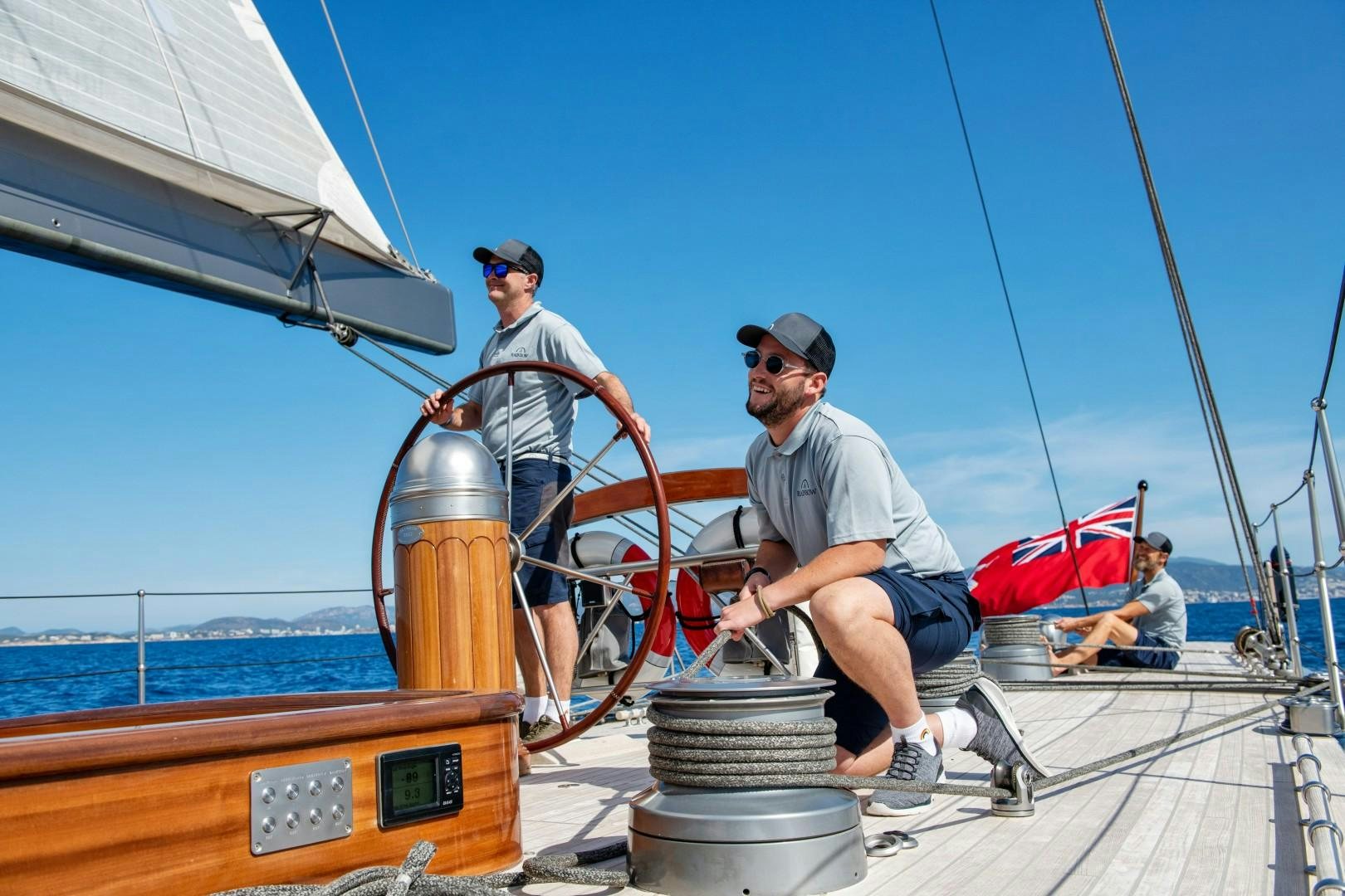 a group of men on a boat aboard RAINBOW Yacht for Sale