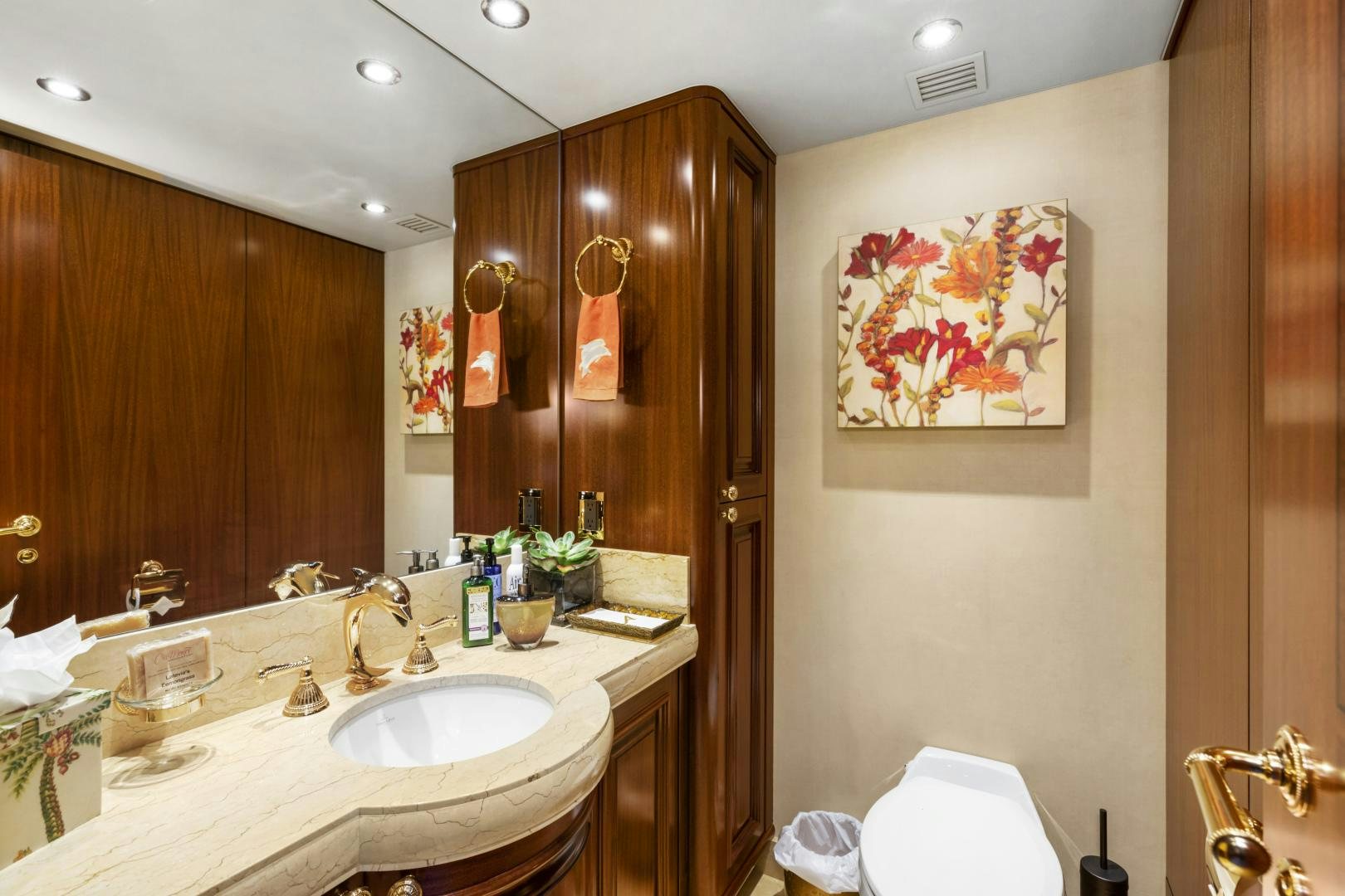 a bathroom with a sink and a mirror aboard APHRODITE Yacht for Sale