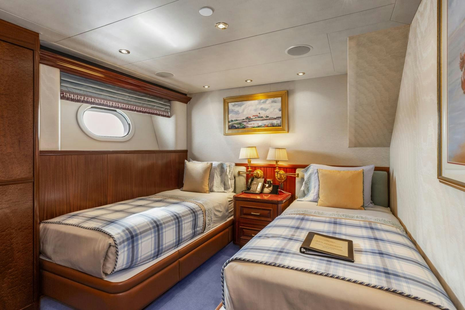 a couple of beds in a room aboard APHRODITE Yacht for Sale