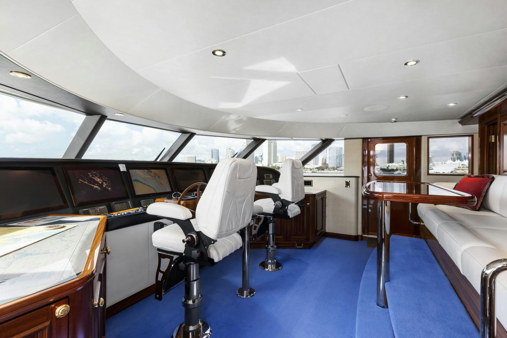 a room with a table and chairs aboard APHRODITE Yacht for Sale