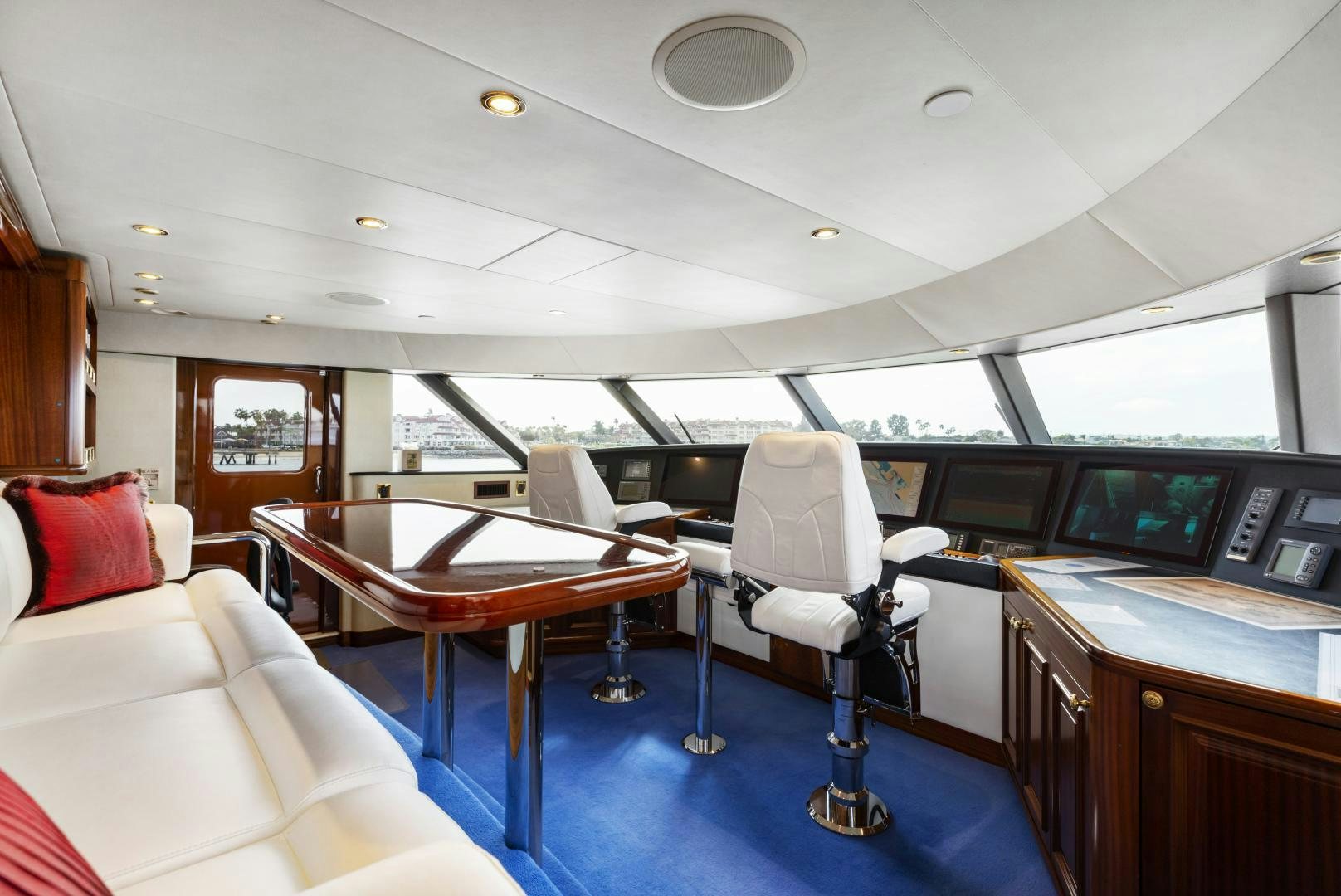 a room with a table and chairs aboard APHRODITE Yacht for Sale