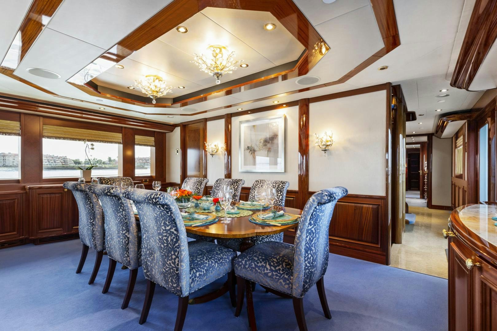 a dining room with a table aboard APHRODITE Yacht for Sale