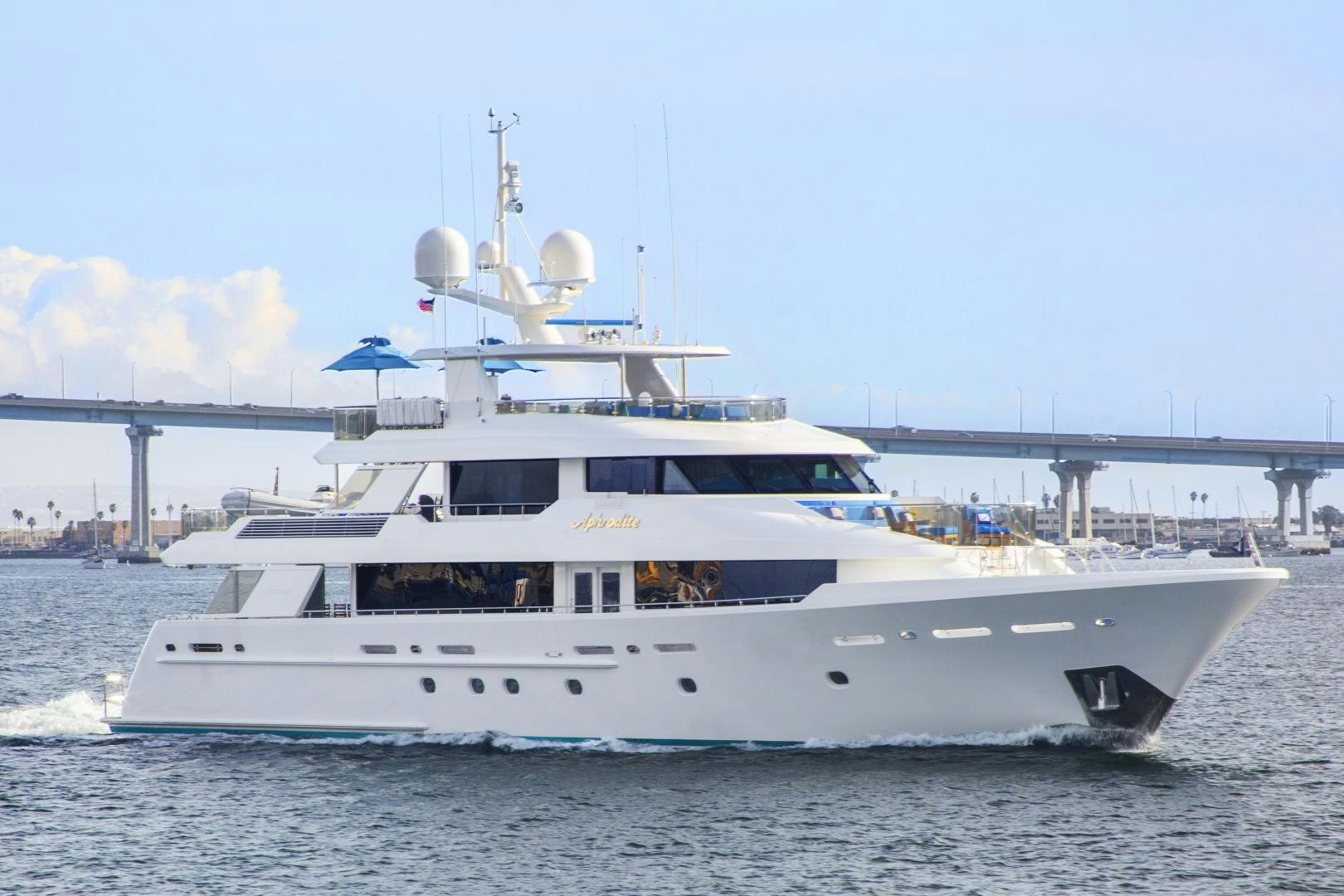 a white yacht on the water aboard APHRODITE Yacht for Sale