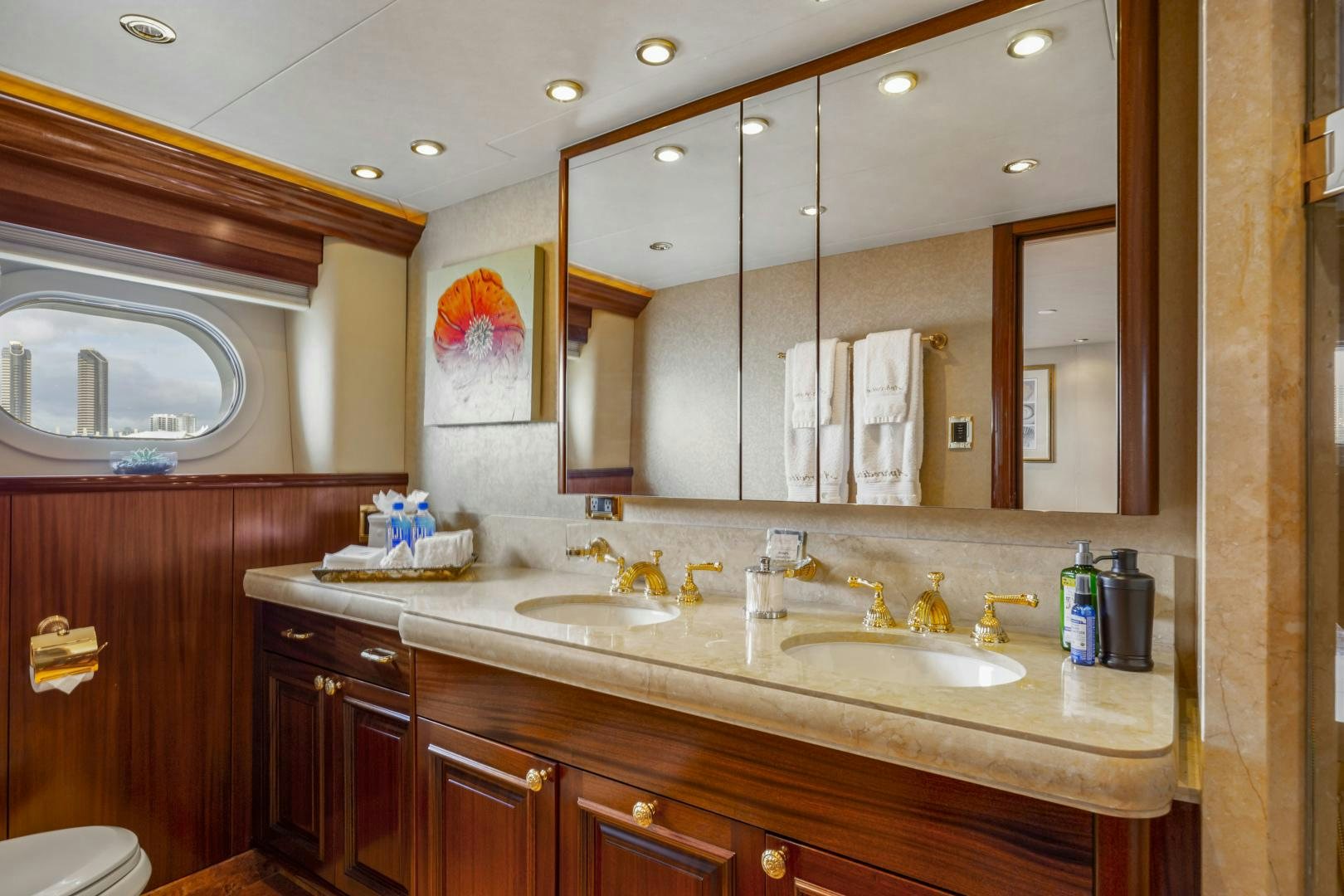 a bathroom with a large mirror aboard APHRODITE Yacht for Sale