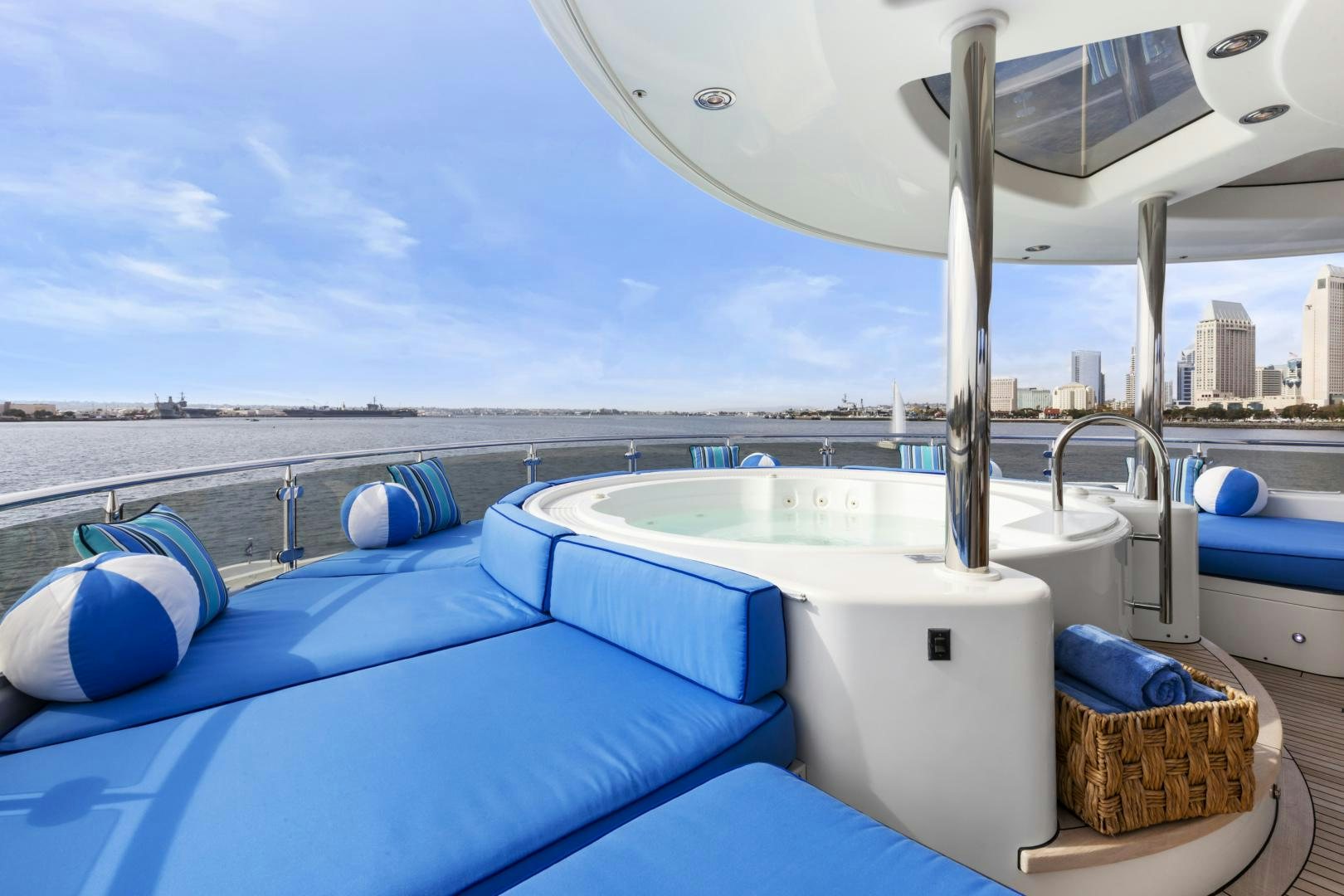 a pool with a large white umbrella aboard APHRODITE Yacht for Sale
