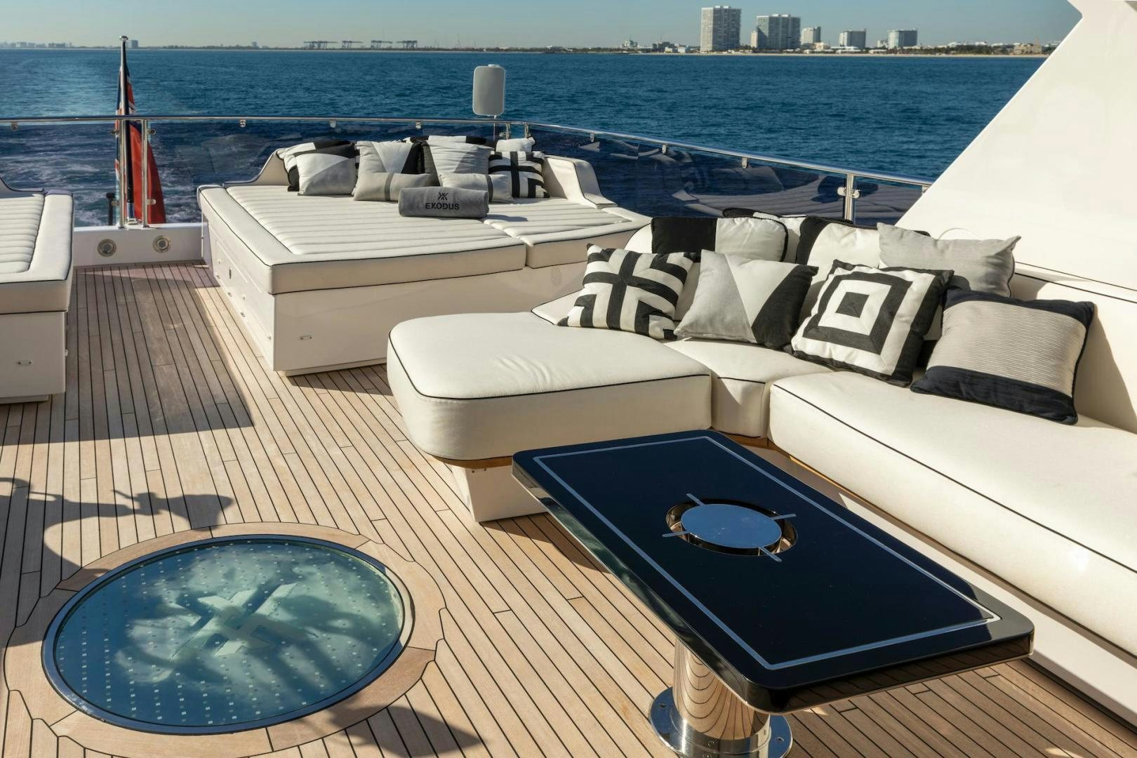 a group of beds on a deck aboard EXODUS Yacht for Sale