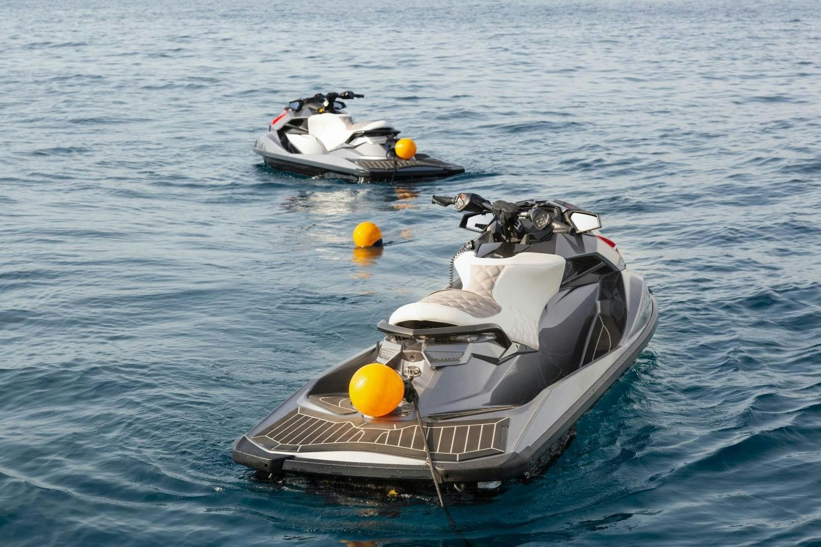 a couple of boats in the water aboard EXODUS Yacht for Sale