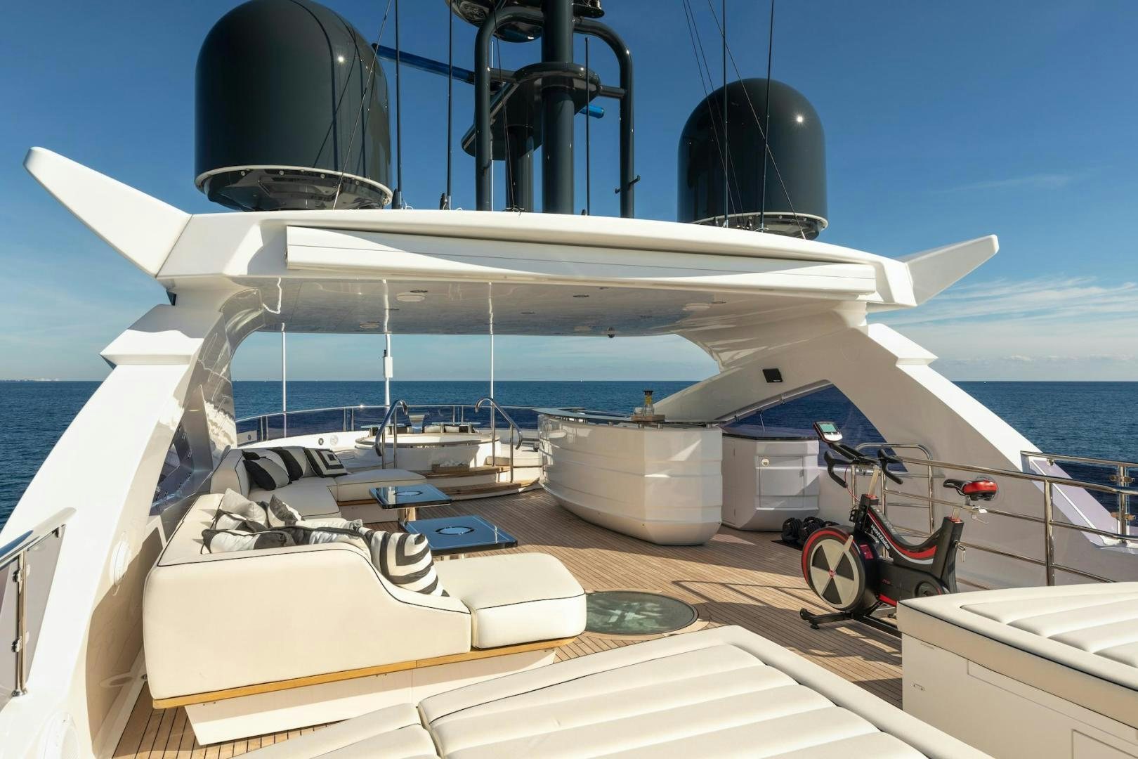a boat with a satellite dish on the deck aboard EXODUS Yacht for Sale
