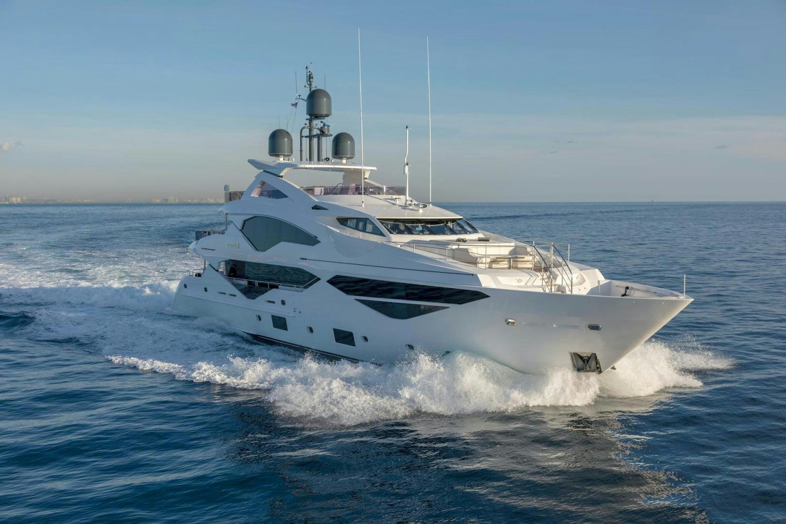 a white yacht in the water aboard EXODUS Yacht for Sale