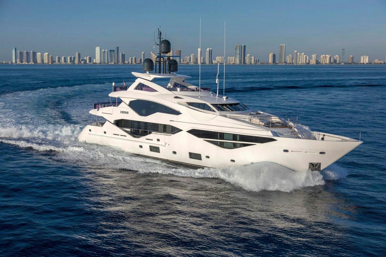 a white yacht on the water aboard EXODUS Yacht for Sale