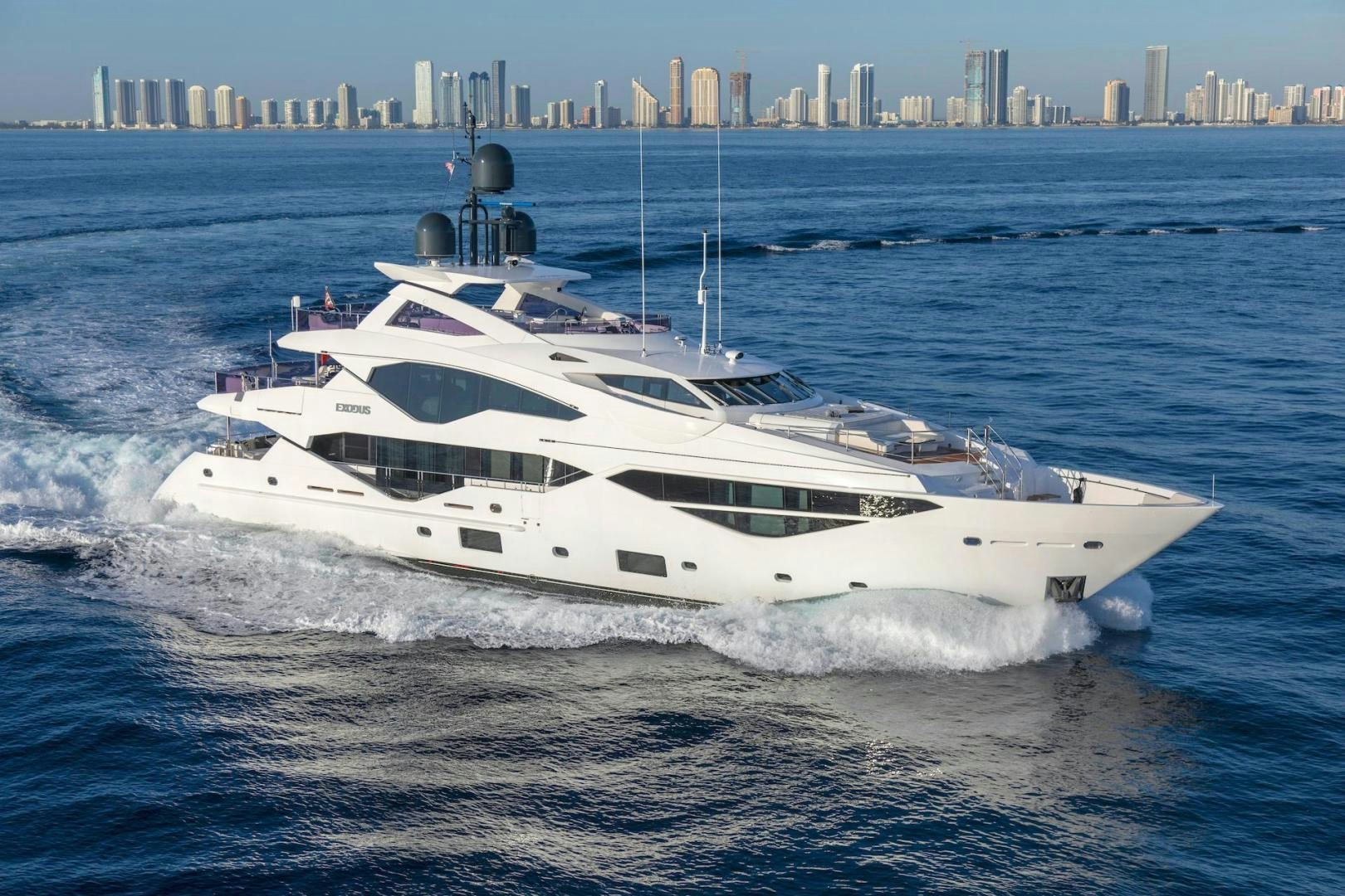 a white yacht in the water aboard EXODUS Yacht for Sale