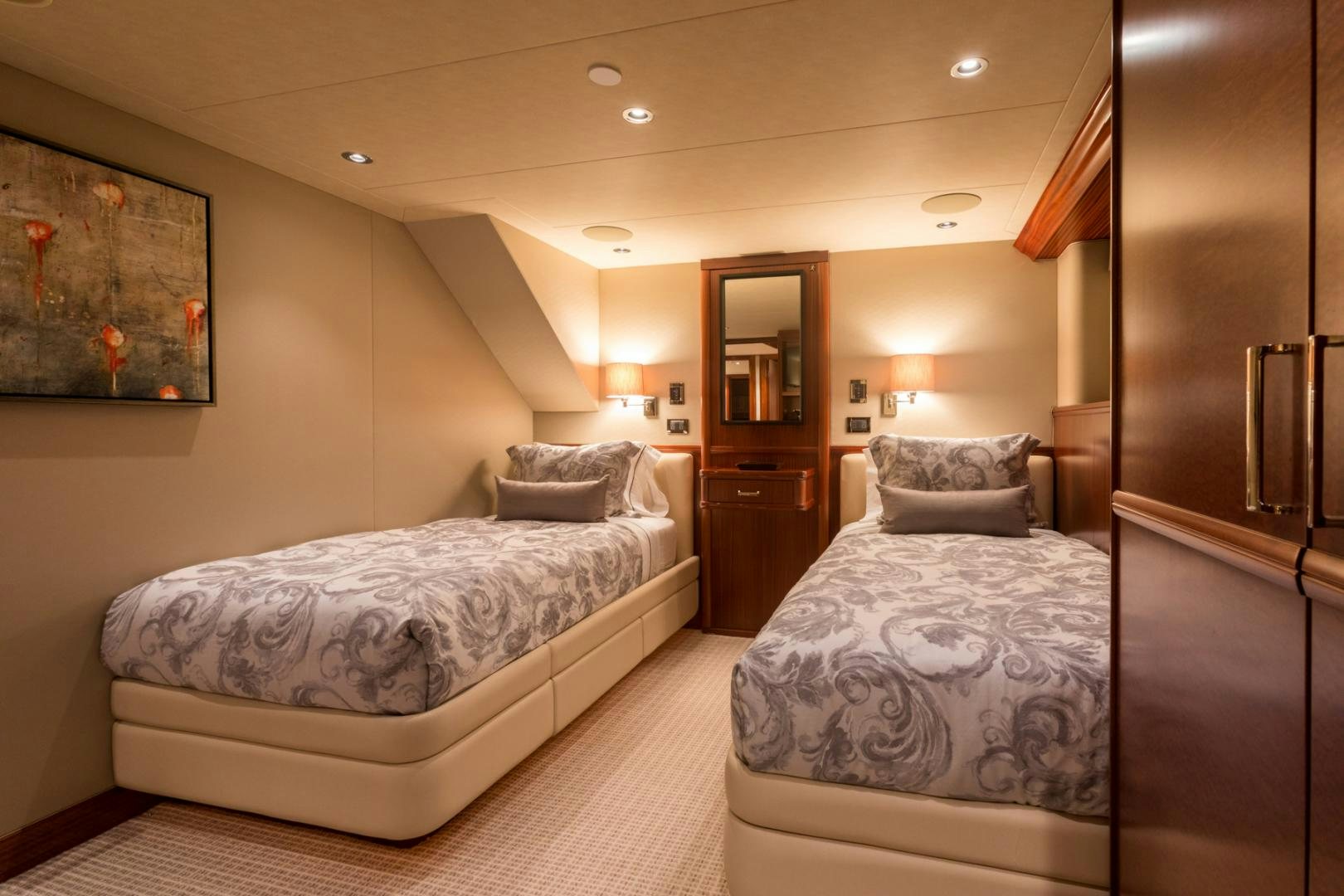 a room with two beds aboard ARMS REACH Yacht for Sale