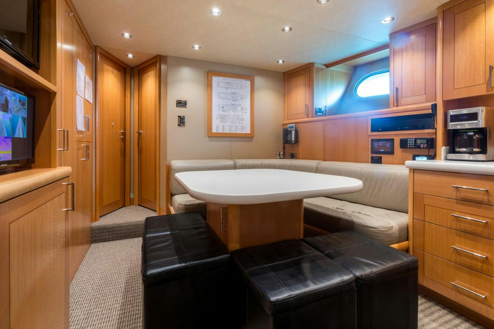 a bathroom with a tub and cabinets aboard ARMS REACH Yacht for Sale