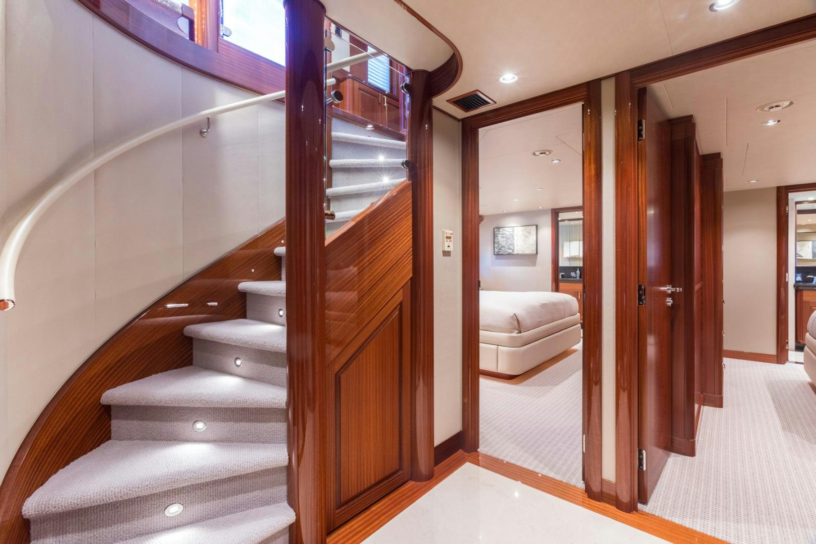 a room with a bed and a closet aboard ARMS REACH Yacht for Sale