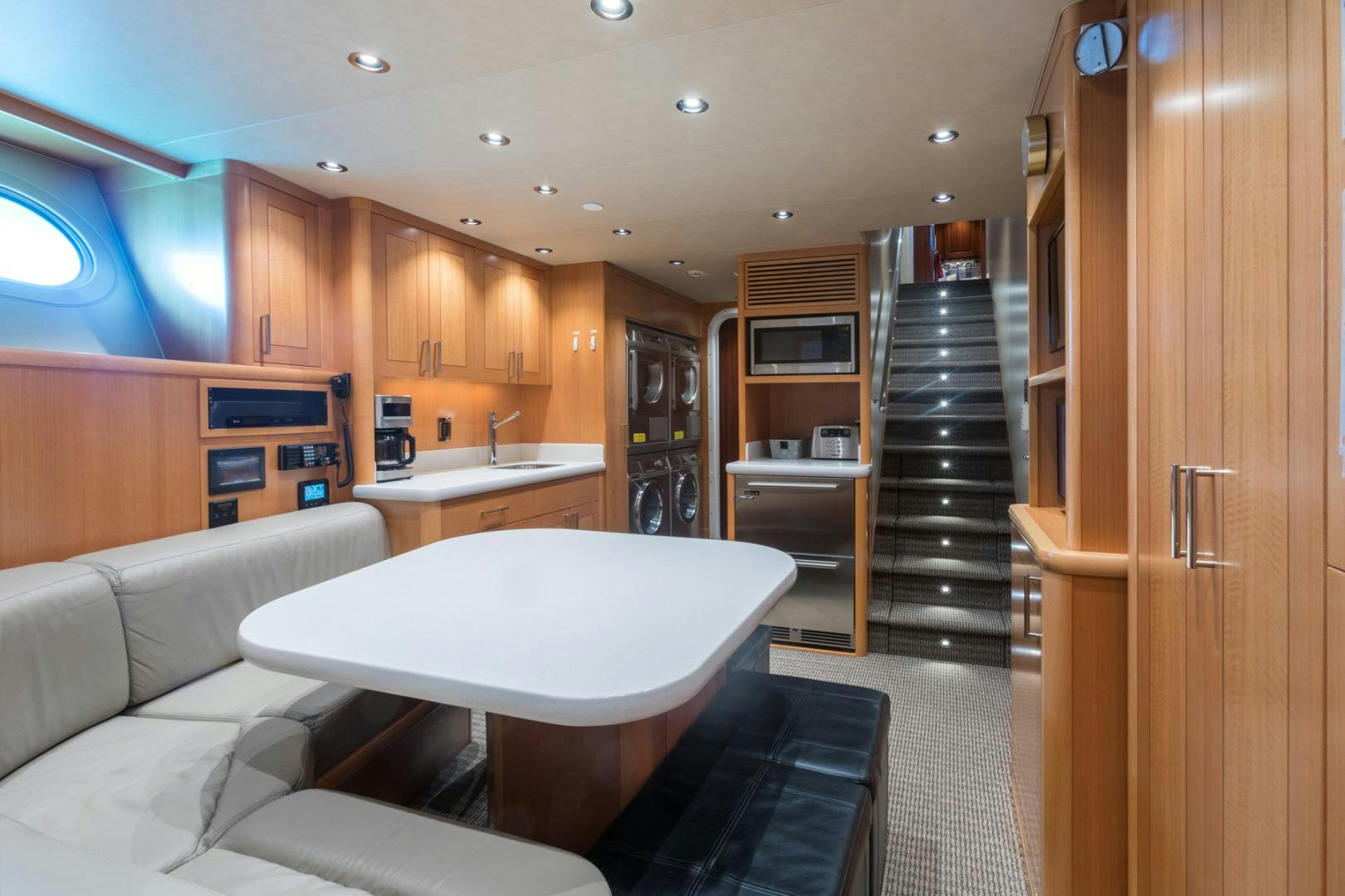 a kitchen and living room aboard ARMS REACH Yacht for Sale