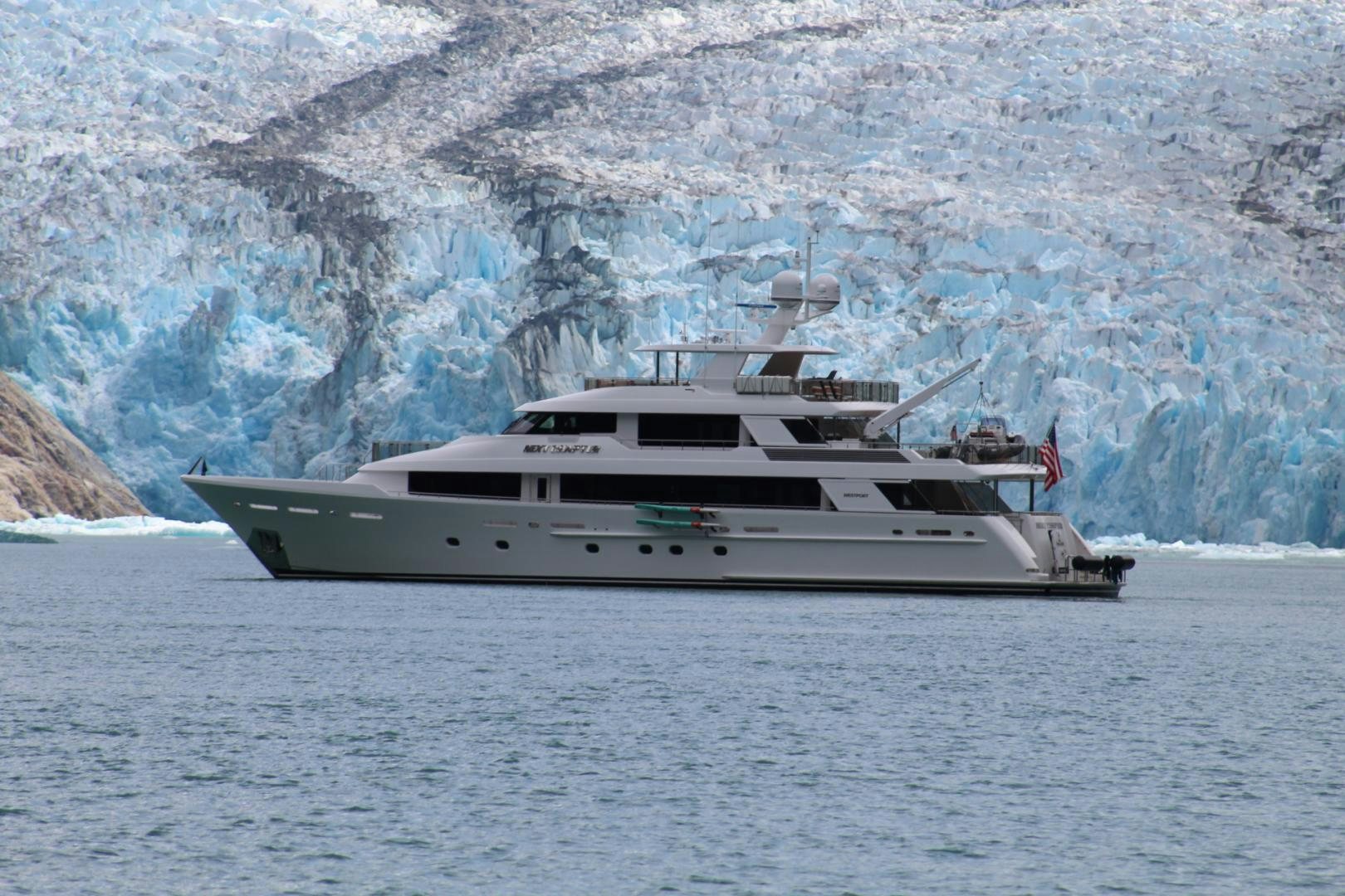 a white yacht in the water aboard ARMS REACH Yacht for Sale