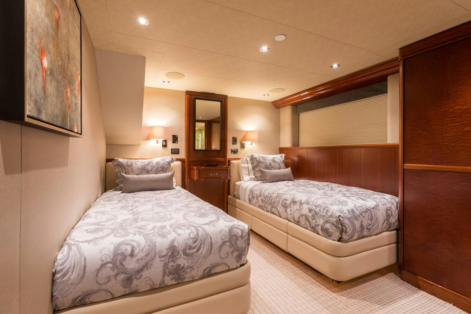 a room with two beds aboard ARMS REACH Yacht for Sale