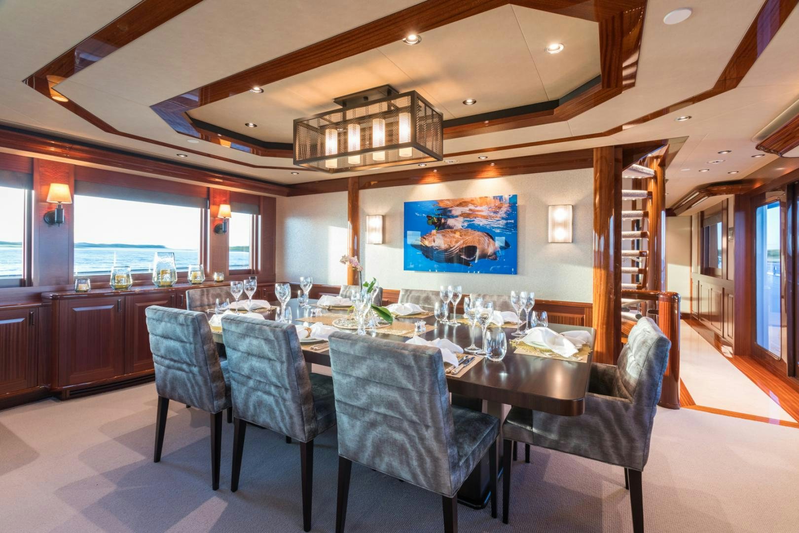 a large dining table in a large kitchen aboard ARMS REACH Yacht for Sale