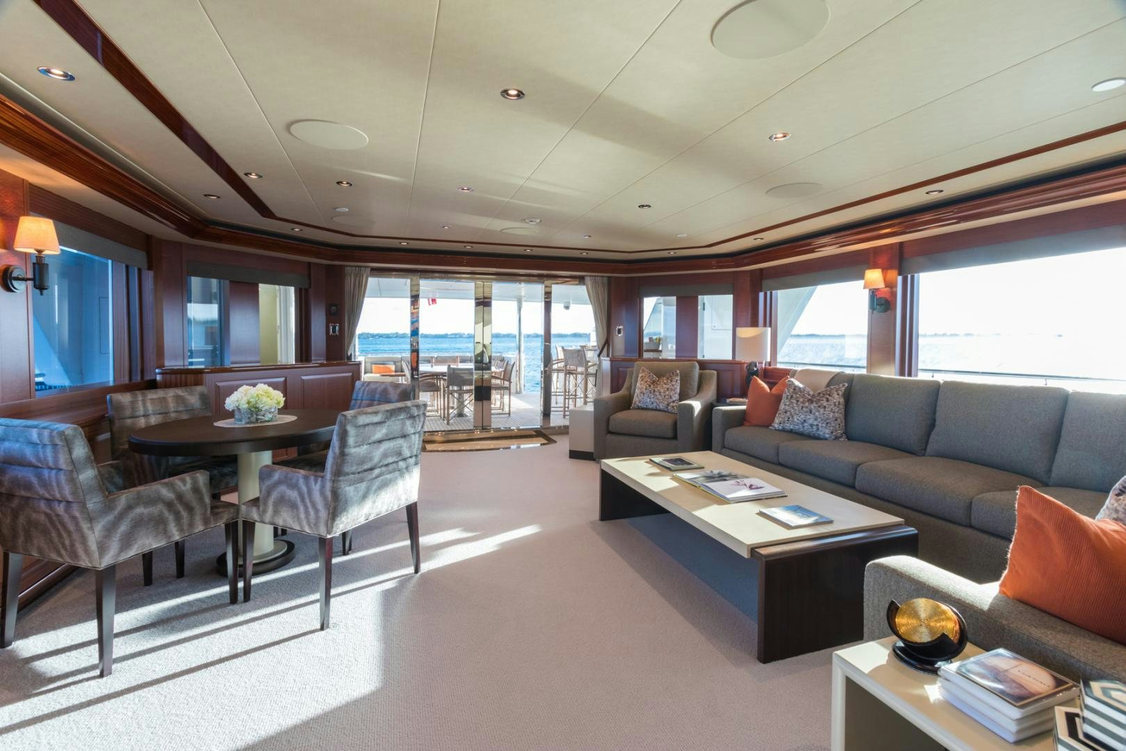 a living room with a large window aboard ARMS REACH Yacht for Sale