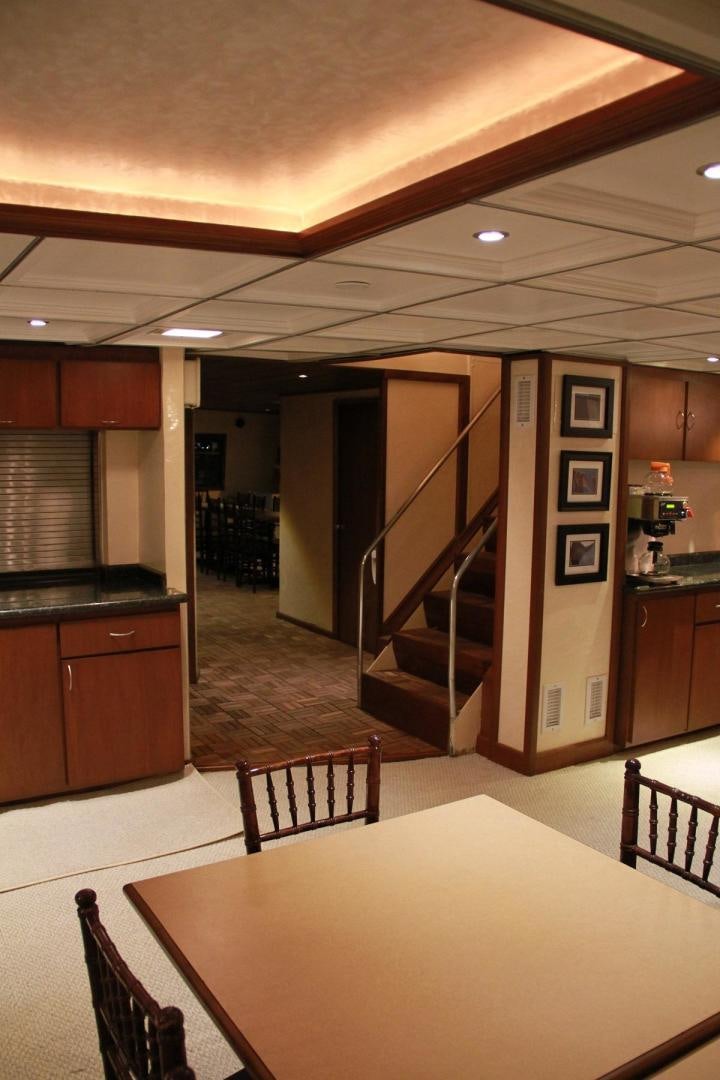a kitchen with a staircase aboard NO NAME Yacht for Sale