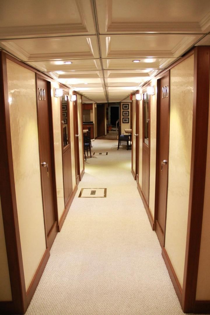 a hallway with doors aboard NO NAME Yacht for Sale
