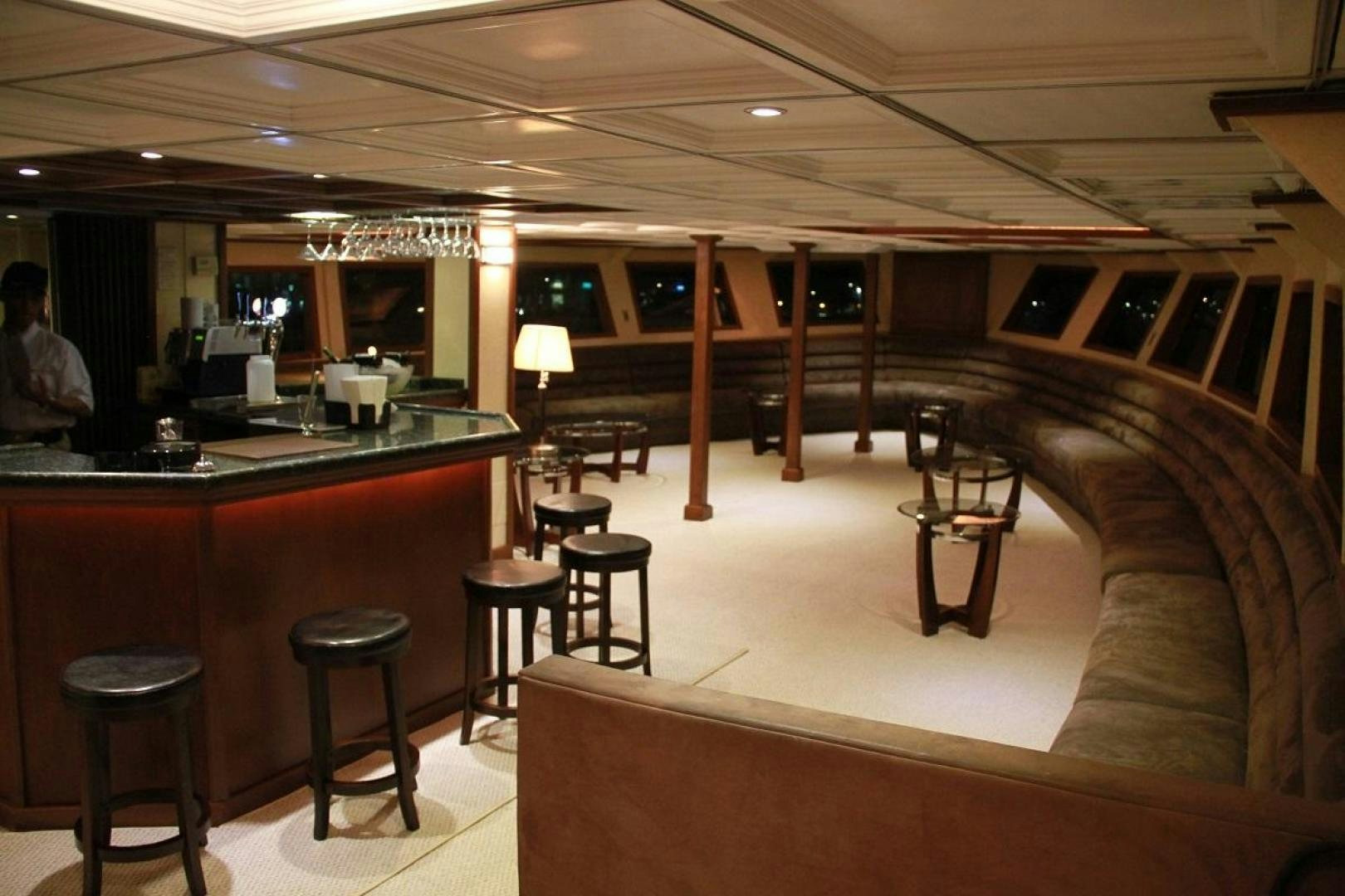 a bar with stools and stools aboard NO NAME Yacht for Sale