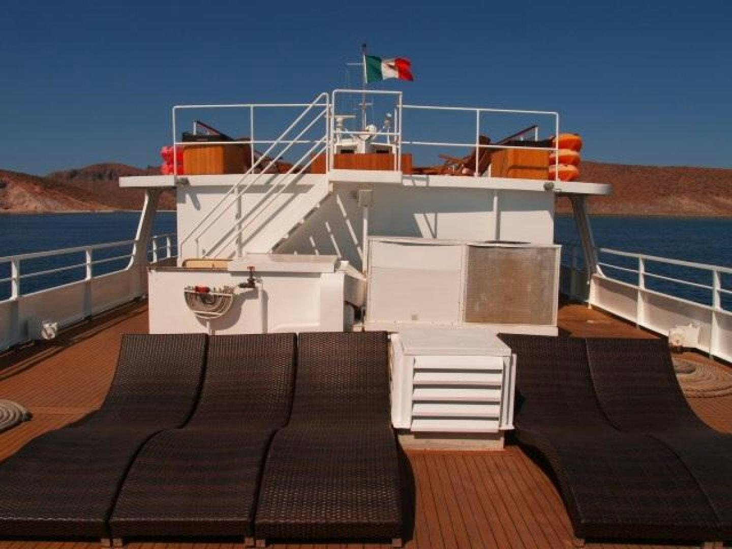 a boat on a deck aboard NO NAME Yacht for Sale