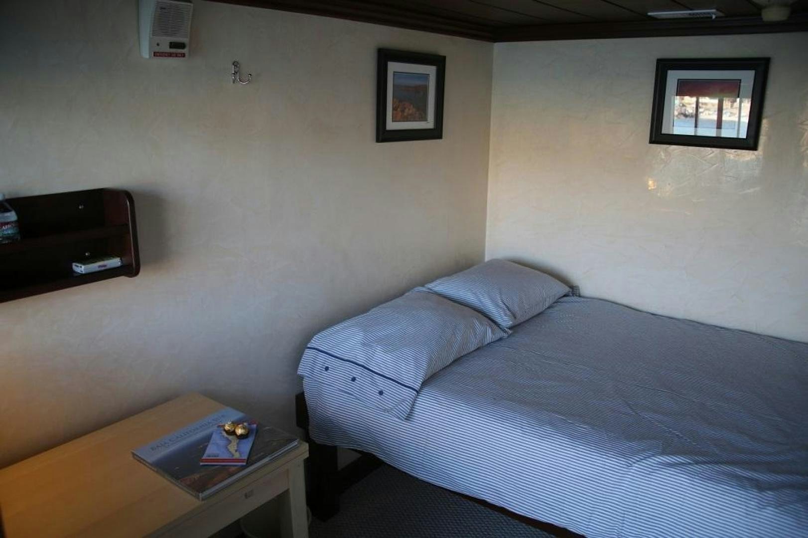 a bed in a room aboard NO NAME Yacht for Sale