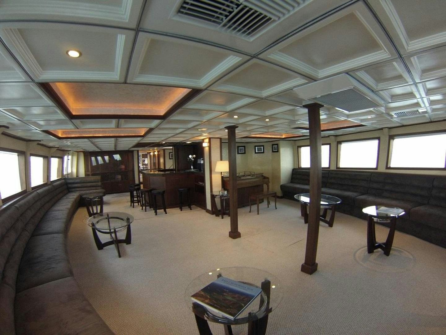 a room with a piano and a piano aboard NO NAME Yacht for Sale