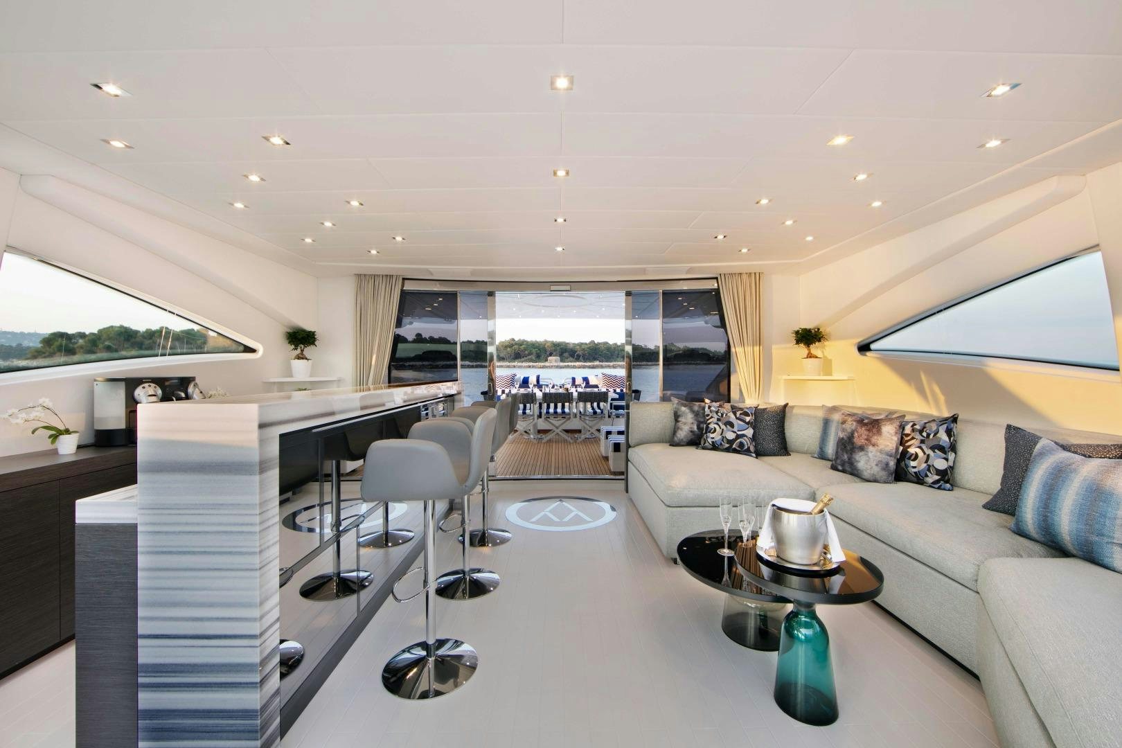 a living room with a large window aboard VENI VIDI VICI Yacht for Sale