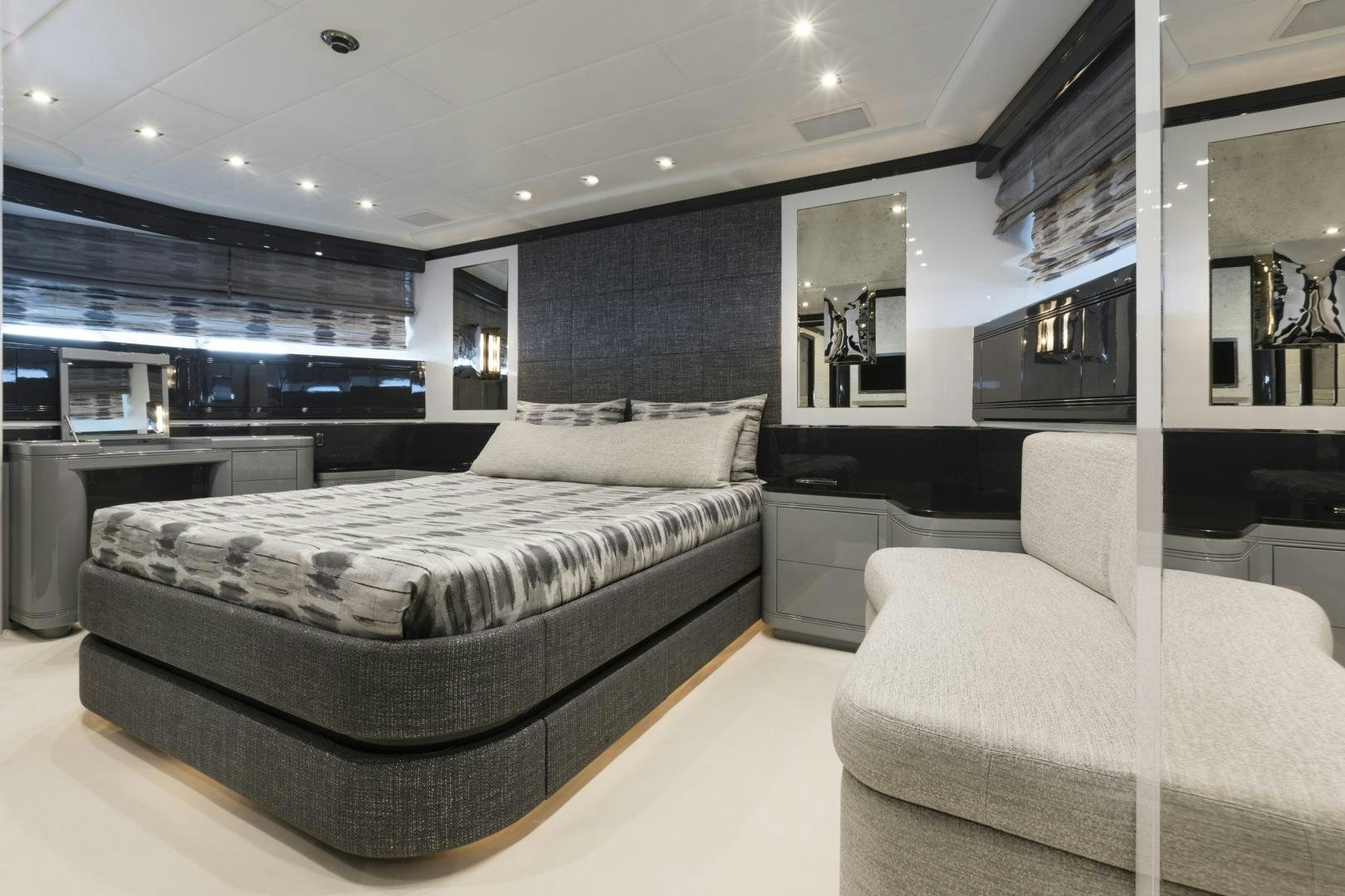 a large bedroom with a large bed aboard VENI VIDI VICI Yacht for Sale