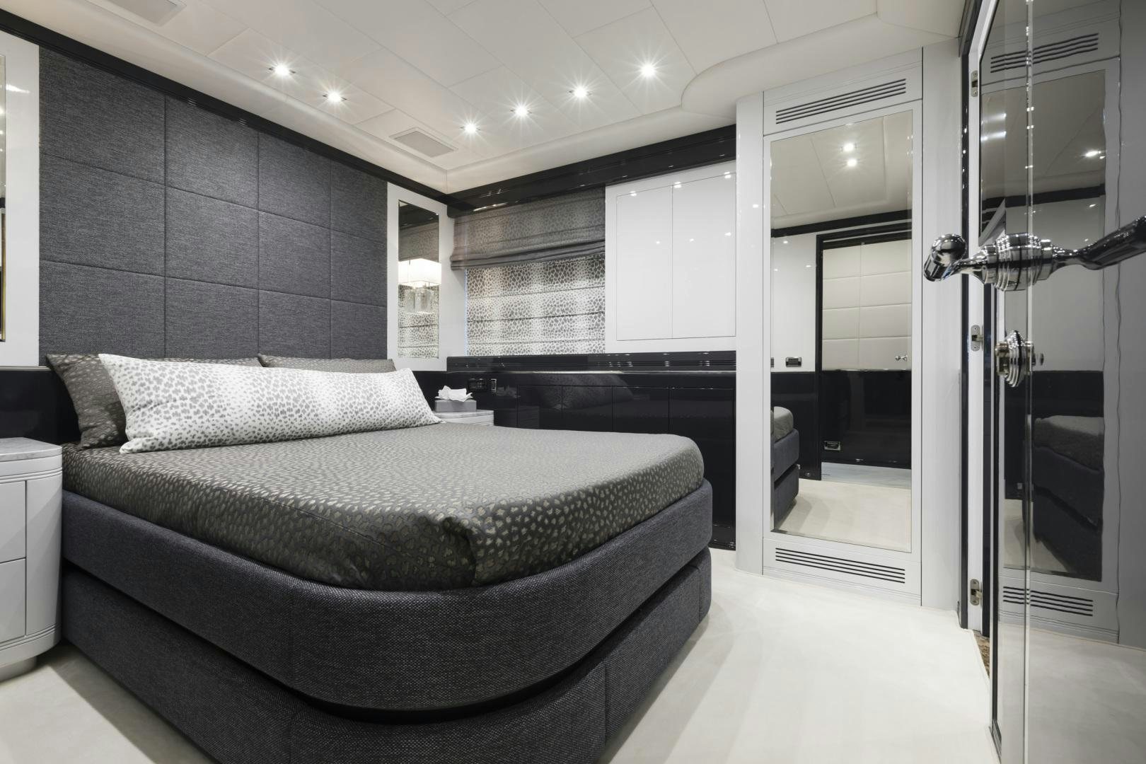 a large bedroom with a bed aboard VENI VIDI VICI Yacht for Sale