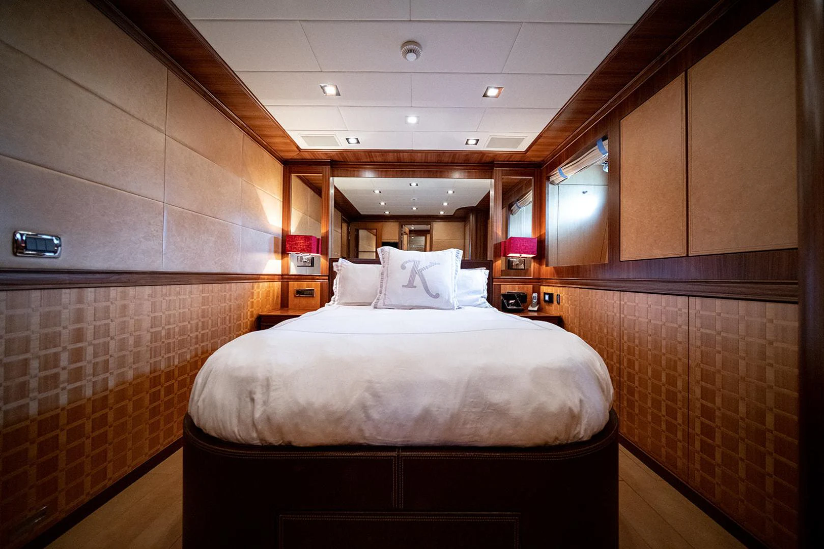 a bed in a room aboard KABIR 130S STABILIZED WITHOUT TAKING AWAY FROM PERFORMANCE (COPY) Yacht for Sale