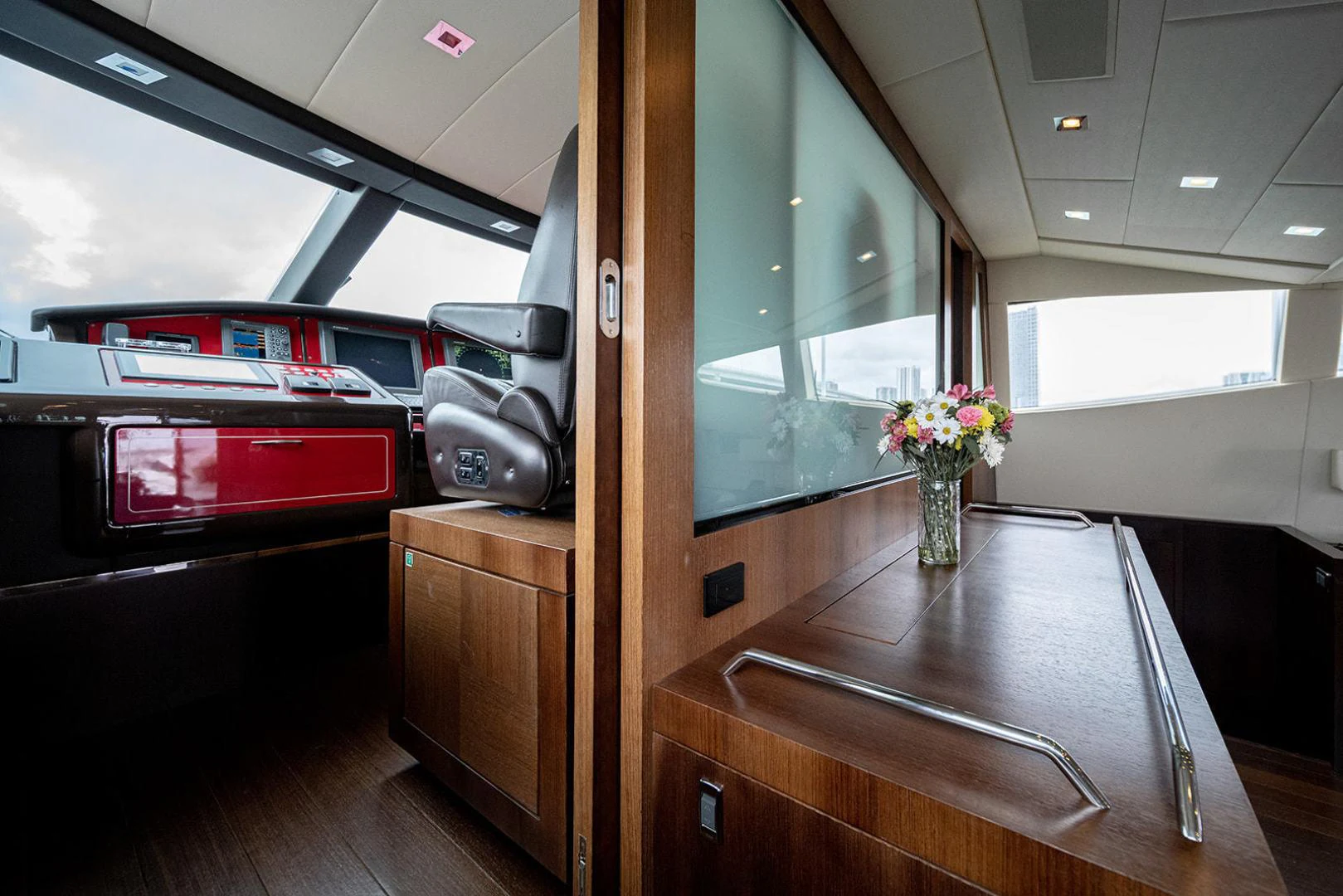 a room with a table and a window aboard KABIR 130S STABILIZED WITHOUT TAKING AWAY FROM PERFORMANCE (COPY) Yacht for Sale