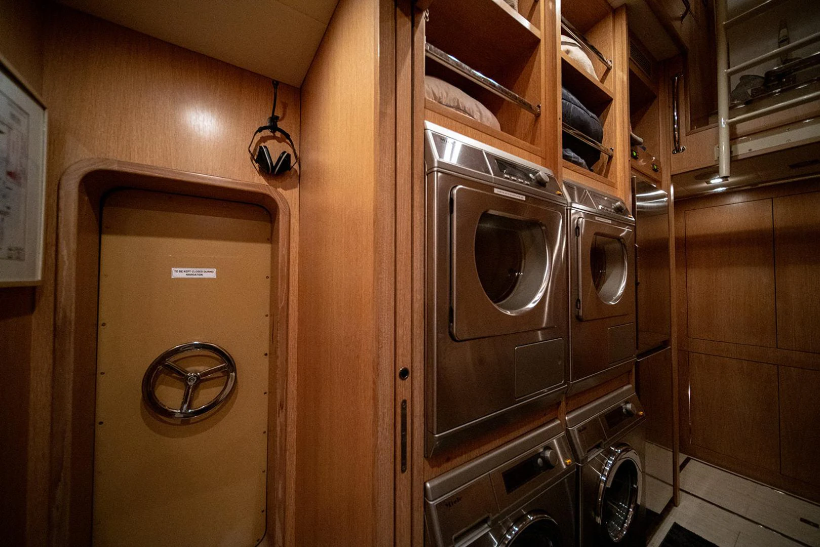 a room with a large closet aboard KABIR 130S STABILIZED WITHOUT TAKING AWAY FROM PERFORMANCE (COPY) Yacht for Sale