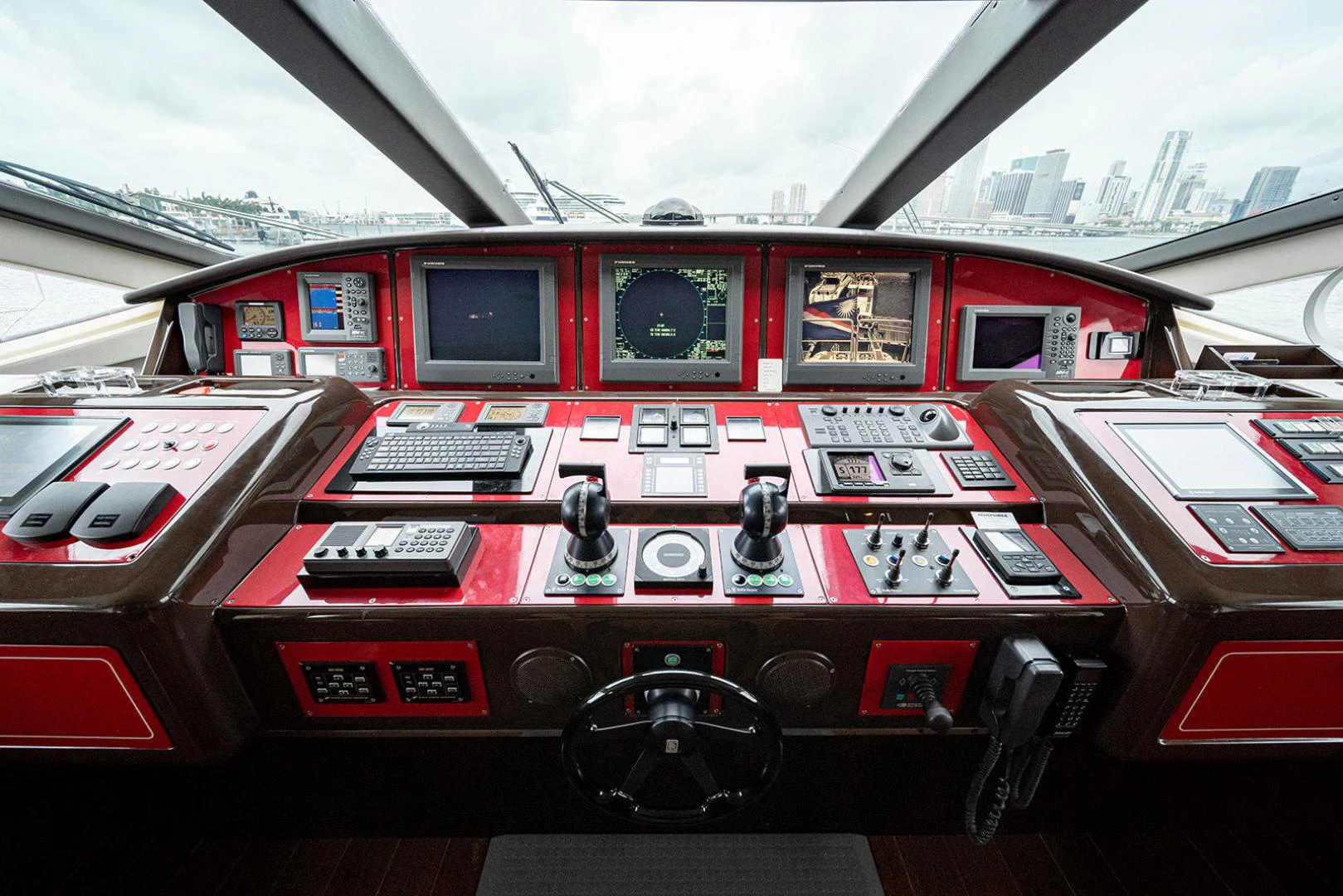 inside of a red car aboard KABIR 130S STABILIZED WITHOUT TAKING AWAY FROM PERFORMANCE (COPY) Yacht for Sale