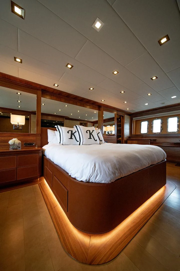 a bed in a room aboard KABIR 130S STABILIZED WITHOUT TAKING AWAY FROM PERFORMANCE (COPY) Yacht for Sale