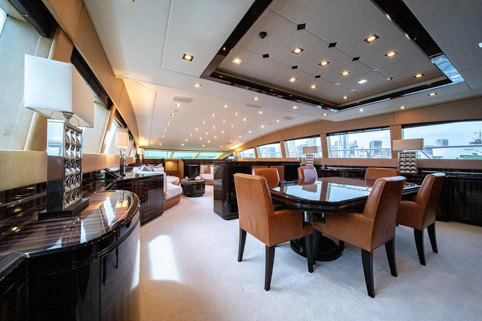 a room with a table and chairs aboard KABIR 130S STABILIZED WITHOUT TAKING AWAY FROM PERFORMANCE (COPY) Yacht for Sale