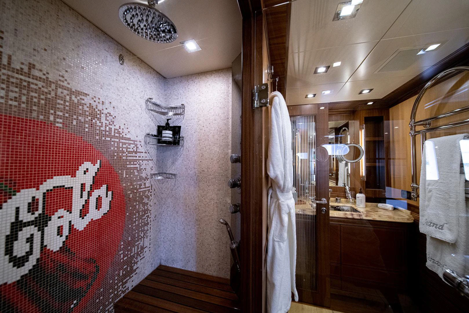 a bathroom with a shower curtain aboard KABIR 130S STABILIZED WITHOUT TAKING AWAY FROM PERFORMANCE (COPY) Yacht for Sale