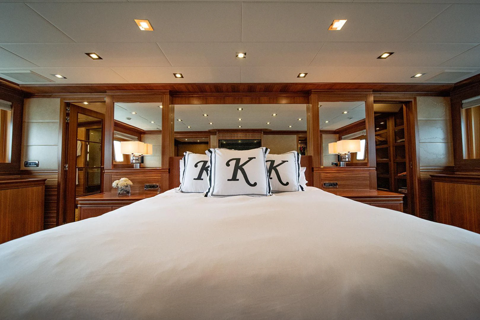a bed in a room aboard KABIR 130S STABILIZED WITHOUT TAKING AWAY FROM PERFORMANCE (COPY) Yacht for Sale