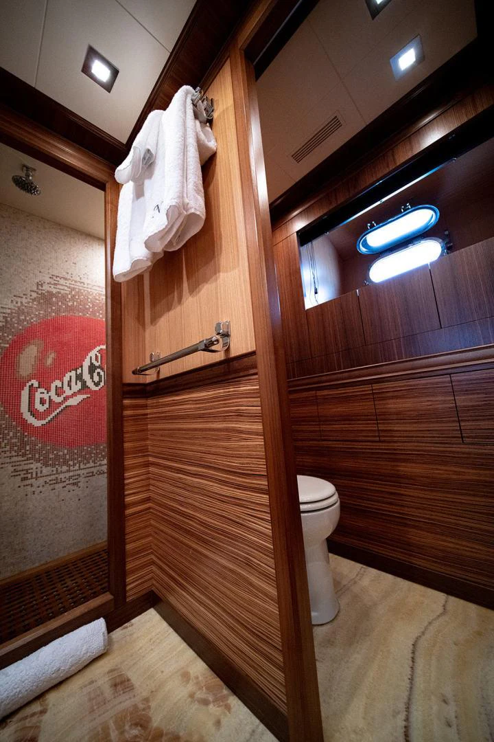 a bathroom with a shower and toilet aboard KABIR 130S STABILIZED WITHOUT TAKING AWAY FROM PERFORMANCE (COPY) Yacht for Sale