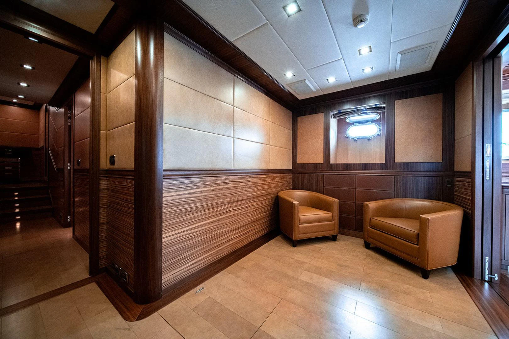 a room with a wood floor and a couch and a wood floor aboard KABIR 130S STABILIZED WITHOUT TAKING AWAY FROM PERFORMANCE (COPY) Yacht for Sale