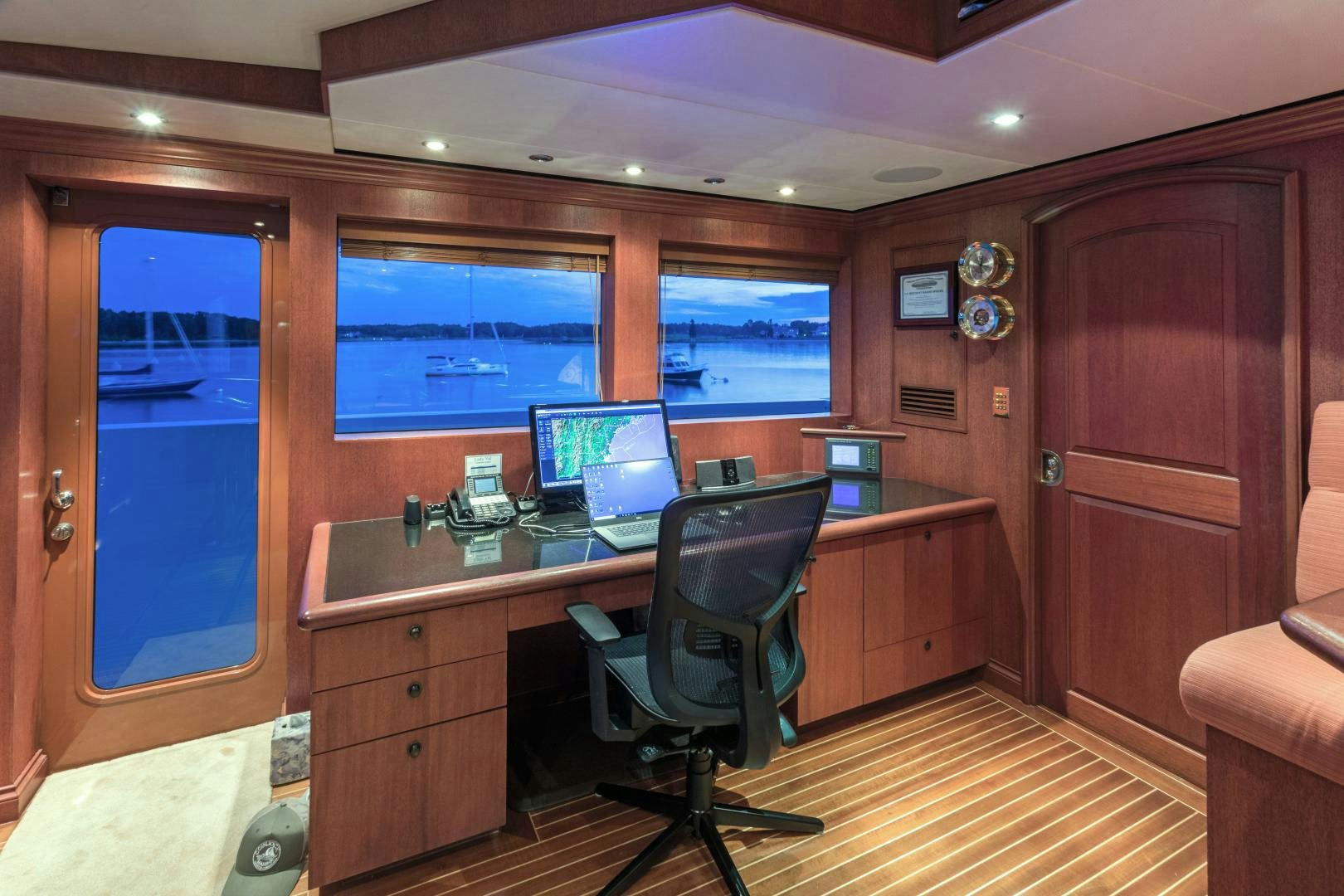 a room with a desk and computer aboard LADY KATH Yacht for Sale