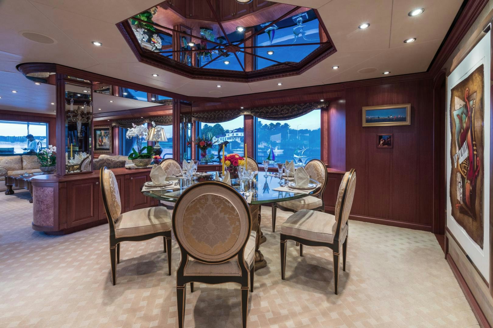 a large dining room with a table and chairs aboard LADY KATH Yacht for Sale
