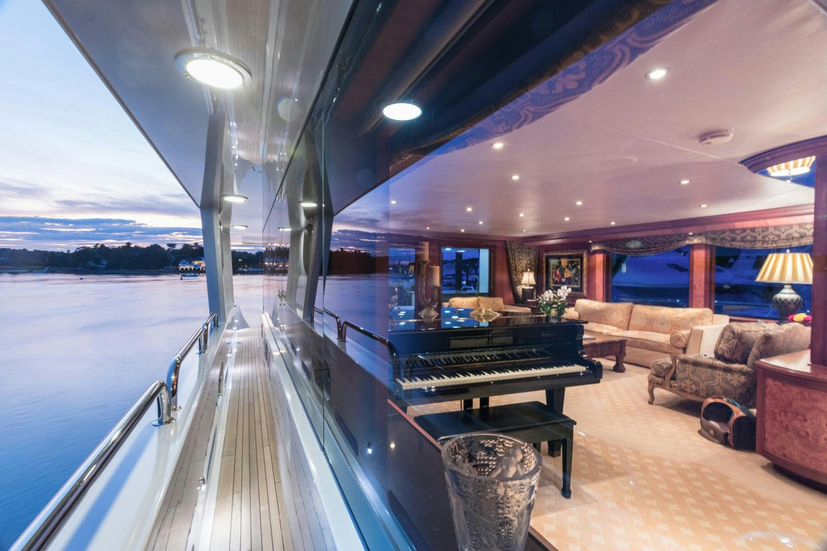 a large room with a pool table and couches aboard LADY KATH Yacht for Sale