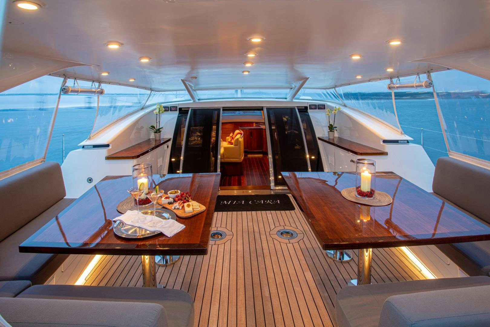 a room with a table and chairs aboard MIA CARA Yacht for Sale