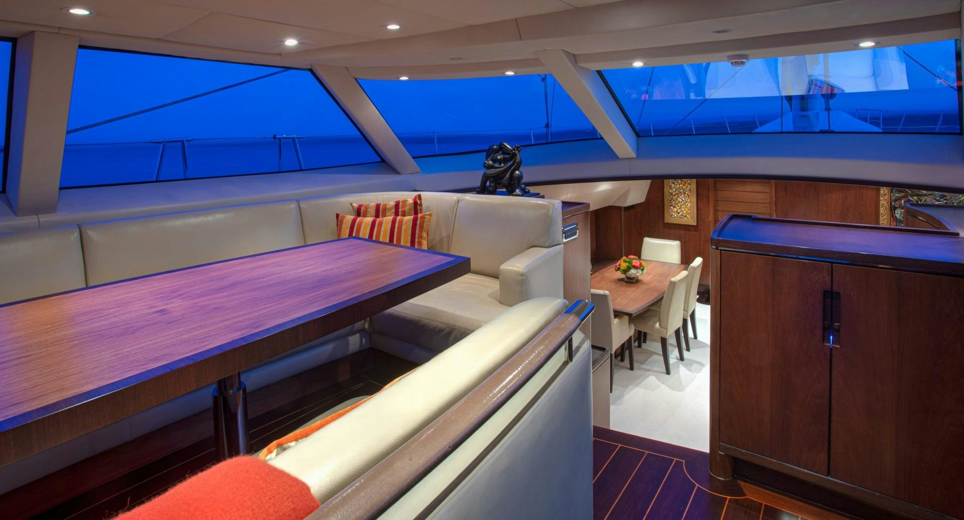 a room with a bed and desk aboard MIA CARA Yacht for Sale
