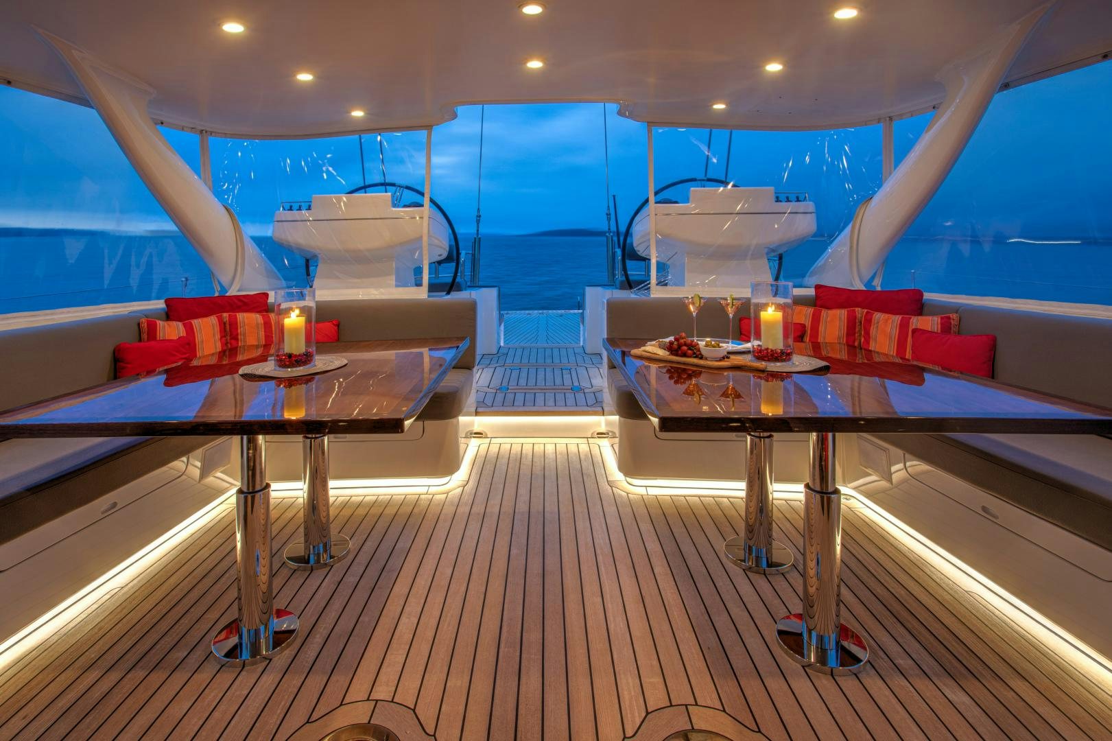 a room with a table and chairs aboard MIA CARA Yacht for Sale
