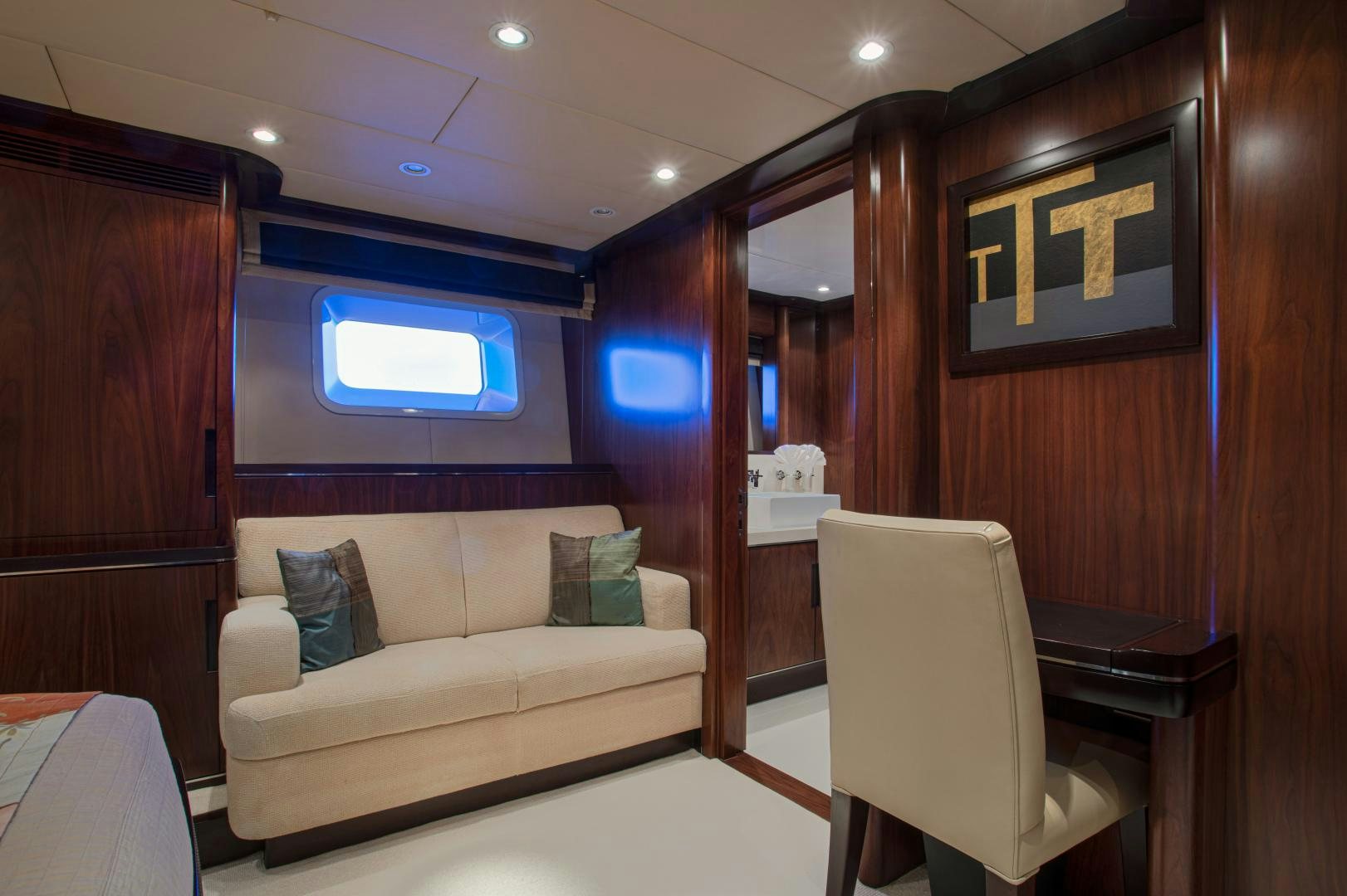 a room with a couch and a television aboard MIA CARA Yacht for Sale